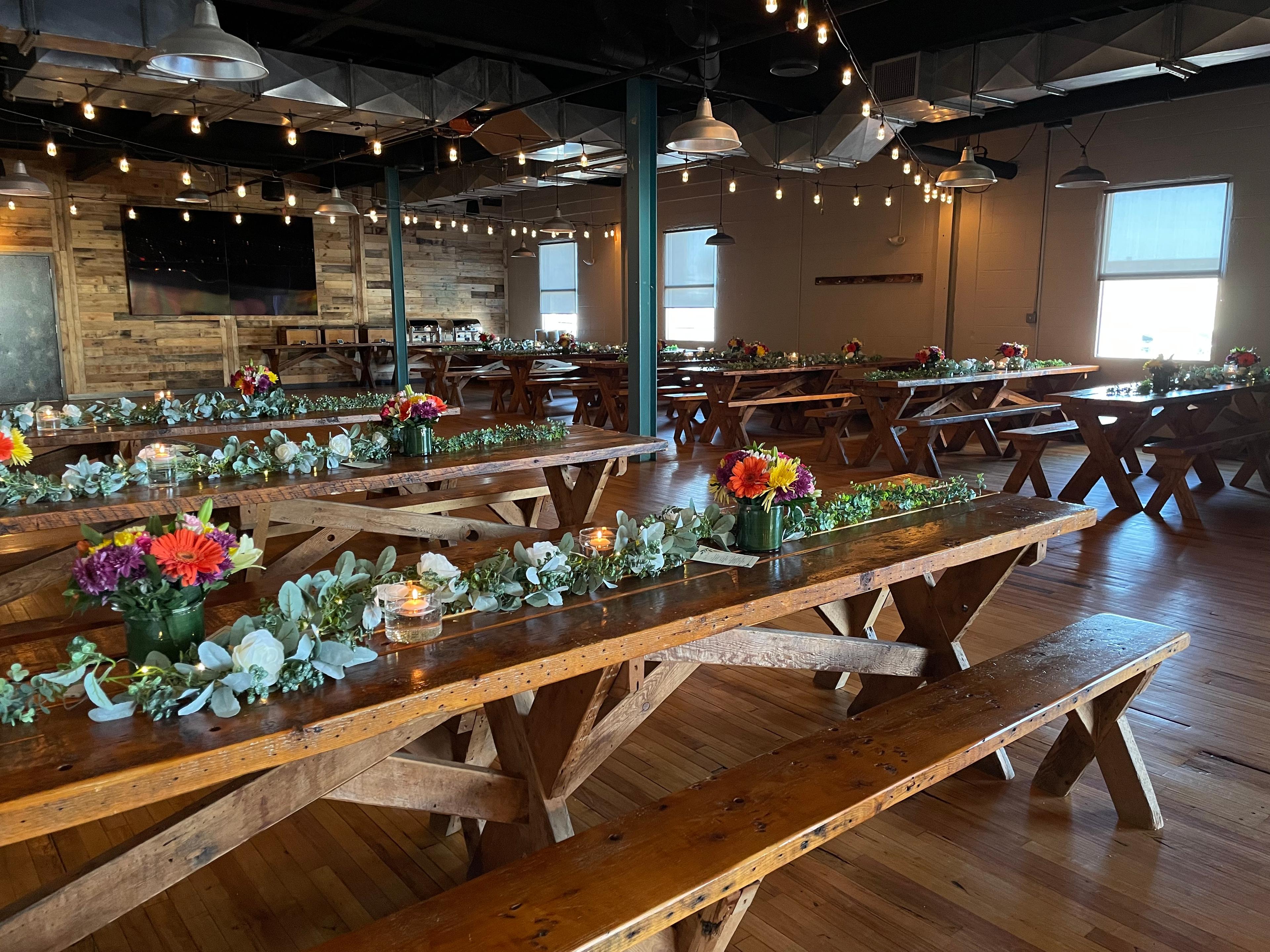 Wedding setup with string lights in the Beach Haus Beer Hall